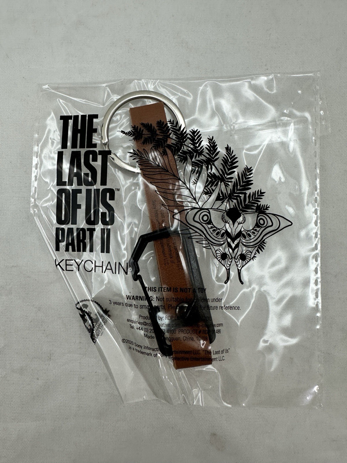 The Last of Us Part II – Promo Keychain RARE – 35th Anniversary Naughty Dog