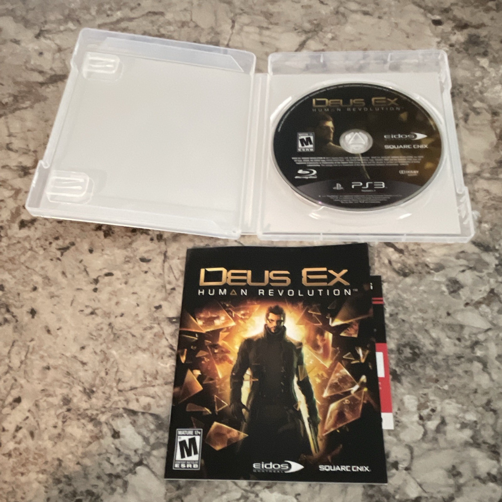Square Enix Deus Ex: Human Revolution (PS3) M Mature, Manual Included