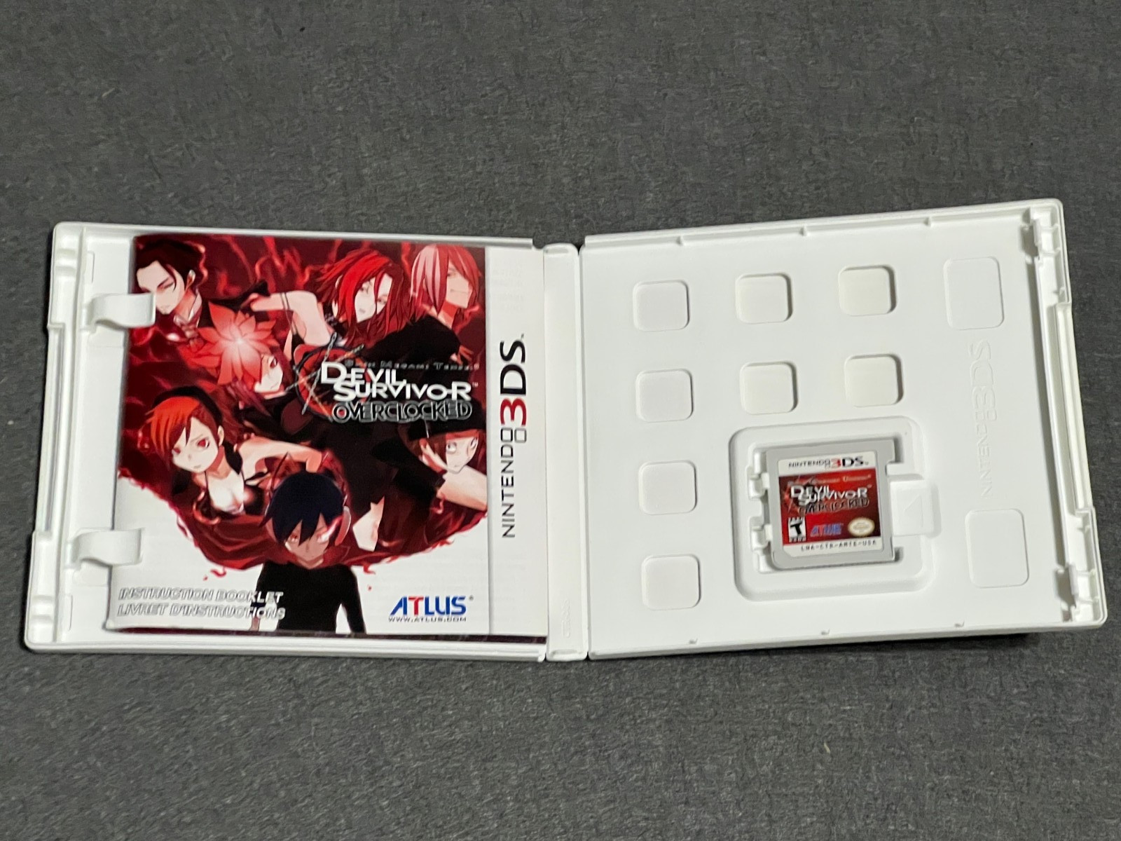 Shin Megami Tensei: Devil Survivor Overclocked (Nintendo 3DS, 2011). Working.