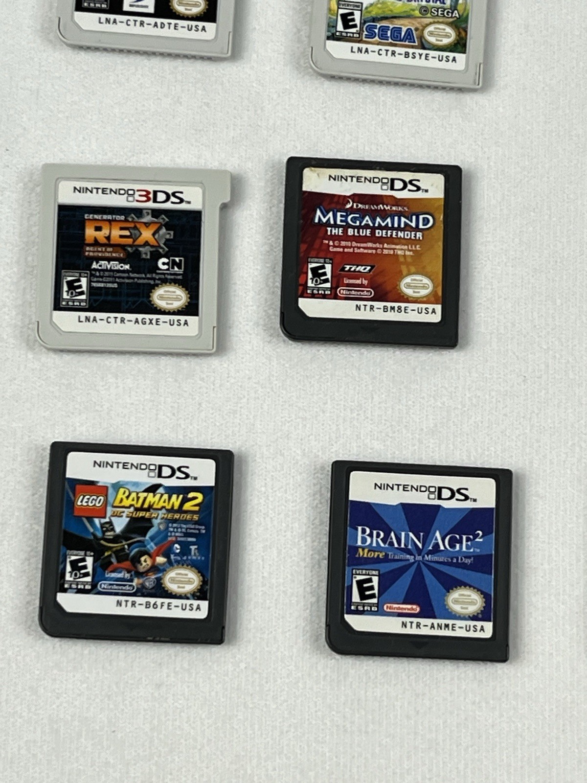 Nintendo 3DS XL Red Bundle w/ Charger, Stylus, SD Card, and 15 DS/3DS Games