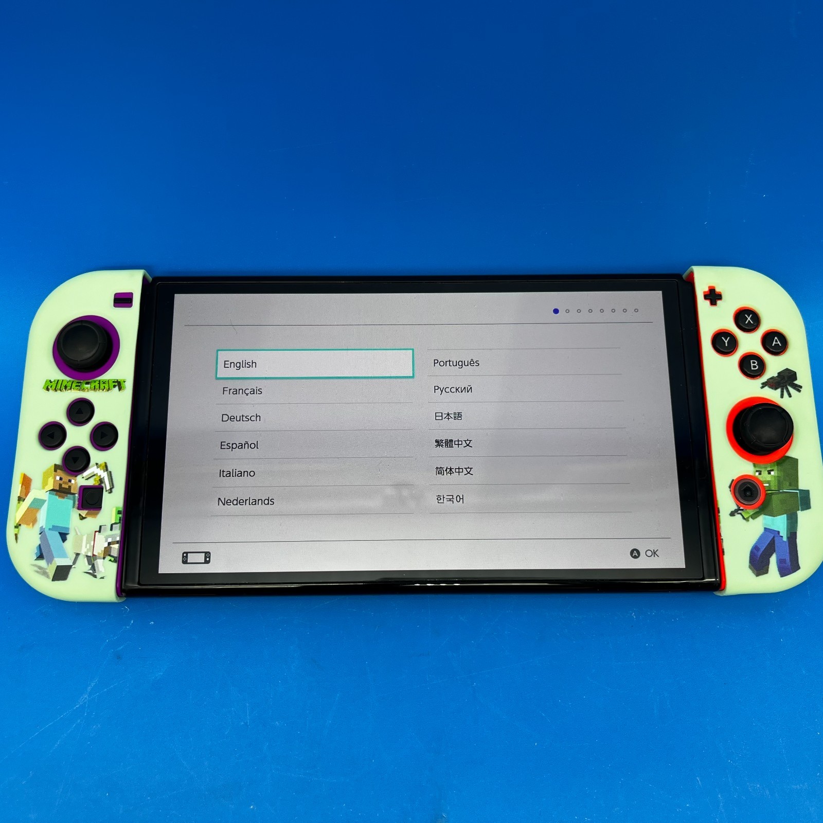 Nintendo Switch OLED Model HEG-001 Handheld Console – 64GB (Red/Purple Joy-Cons)