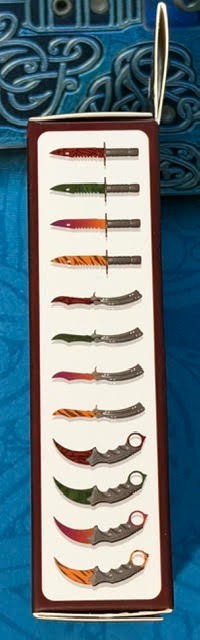 Set of all 12 Knife Pins Counter-Strike 2 Perfect World China – Valve Licensed