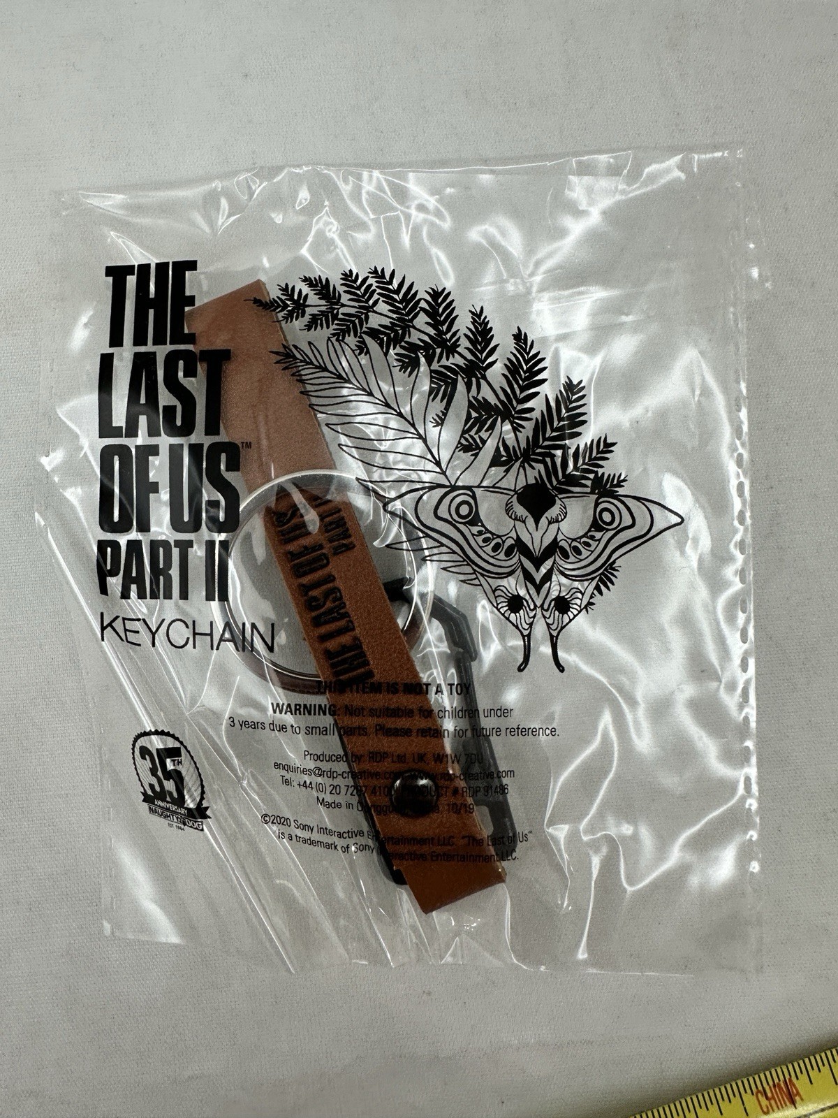 The Last of Us Part II – Promo Keychain RARE – 35th Anniversary Naughty Dog