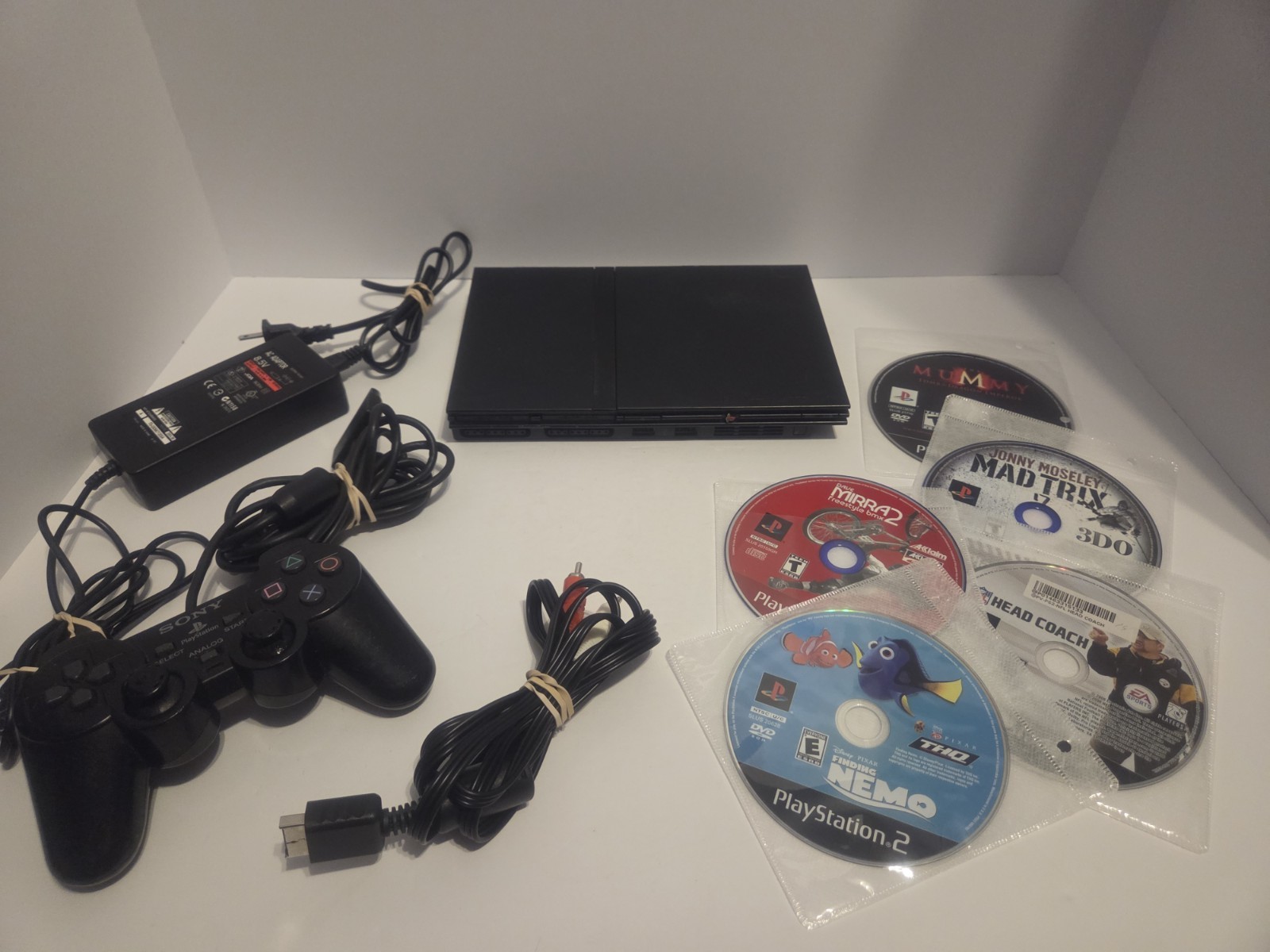 Sony PlayStation 2 Slim SCPH-70001 NTSC-U/C Bundle w/ Controller, Cables, Games