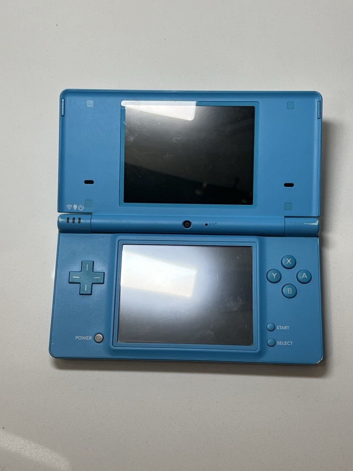 Nintendo DSi Light Blue Handheld Console Game System + Charger + Stylus Tested