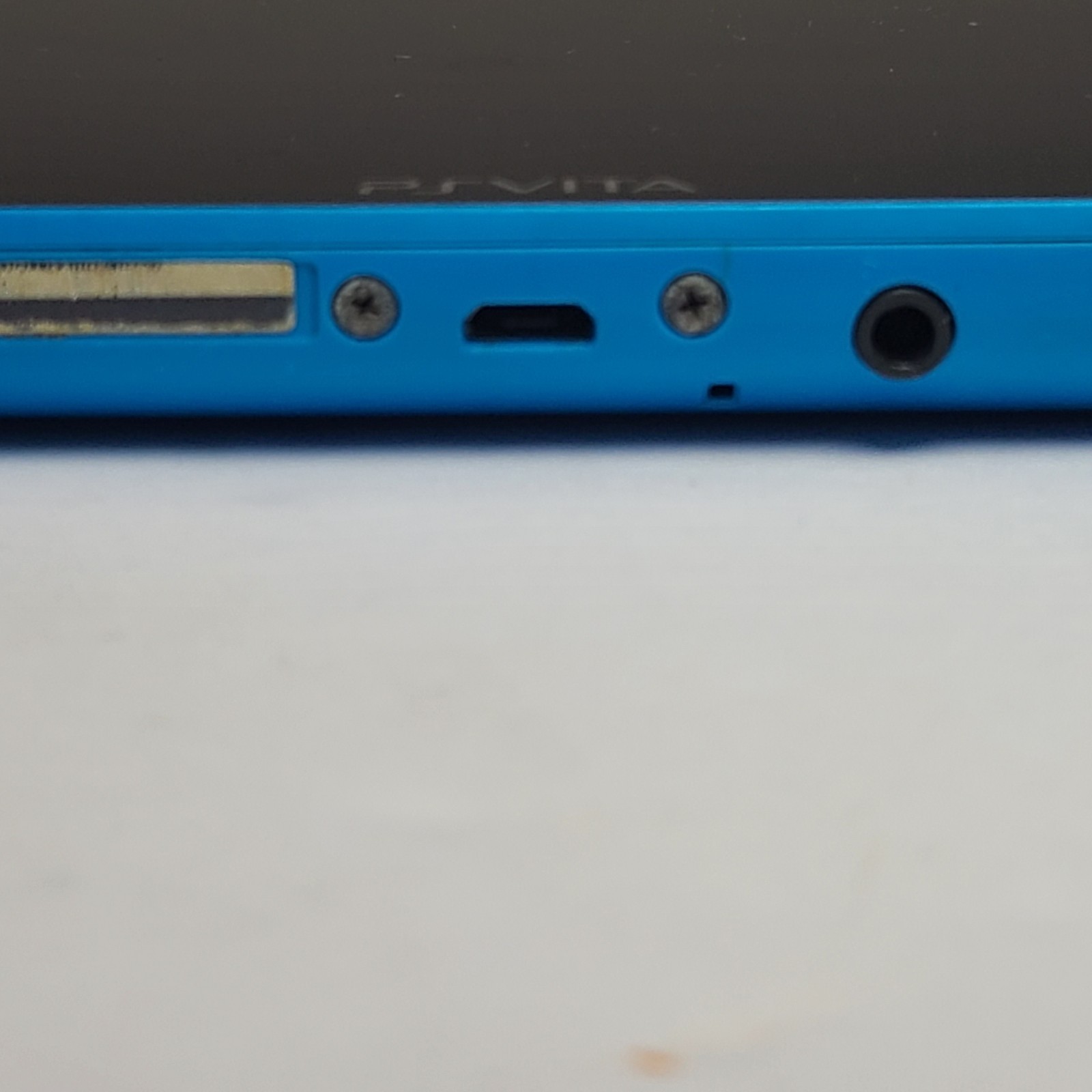 Sony PS Vita PCH 2000 ZA23 Aqua Blue Slim Console W/ LEGO Jurassic World Game