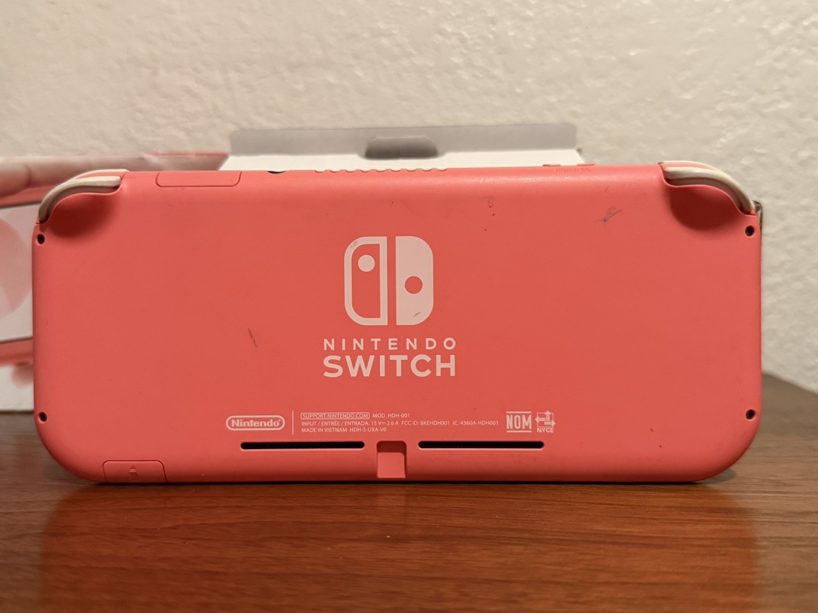 Nintendo Switch Lite 32 GB Gaming Console – Coral + Animal Crossing New Horizons