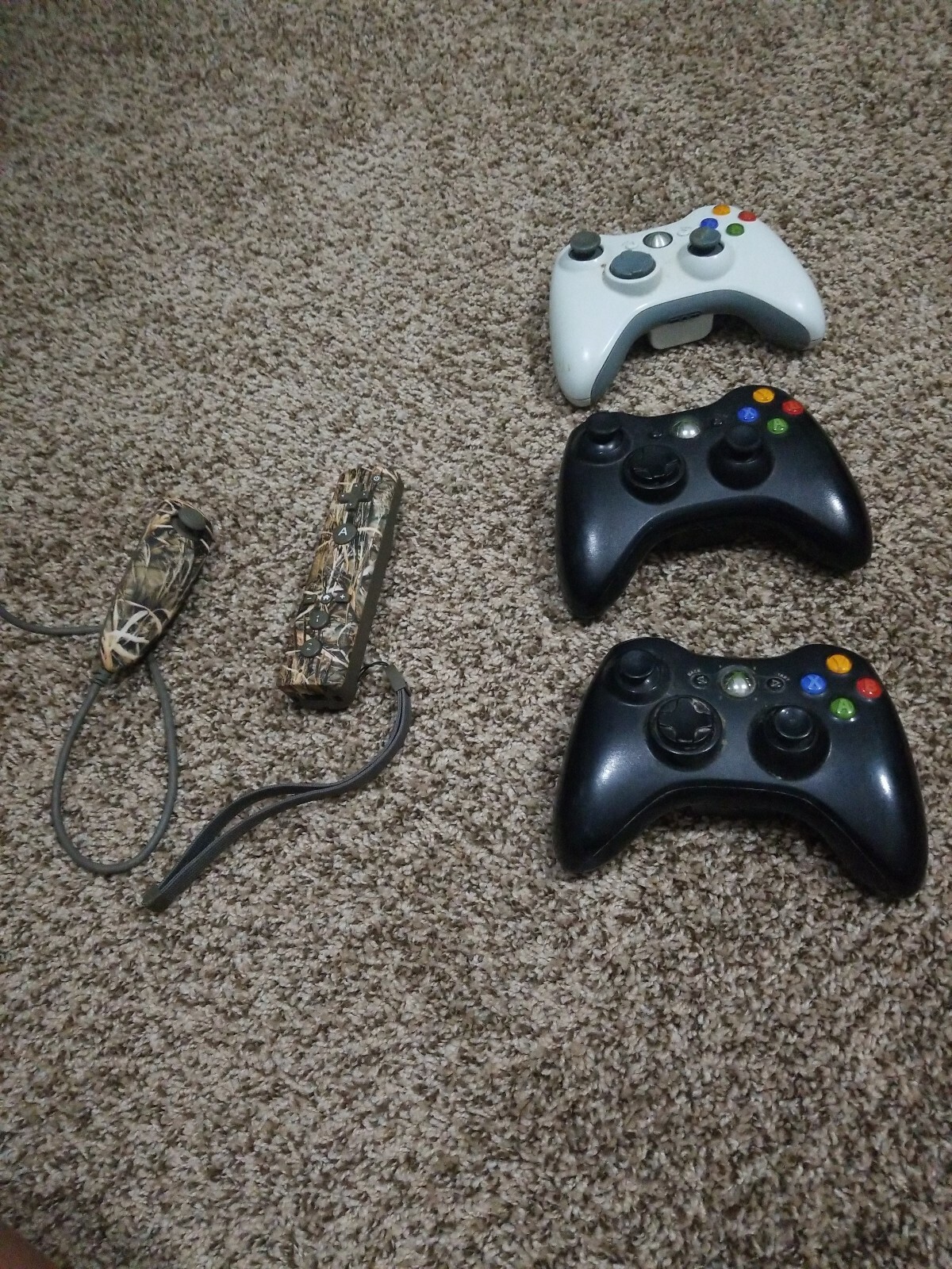 Xbox And Wii Remotes As Is Of For Parts not sure if they work or not no backs