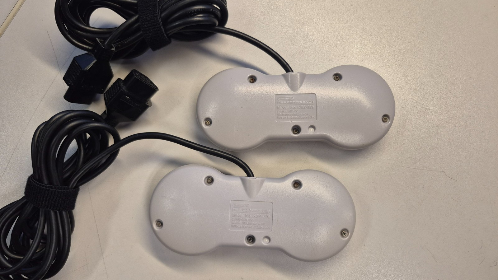 (2) Nintendo NES NES-039 Dog Bone Controllers Official Authentic WORKS PERFECT!!