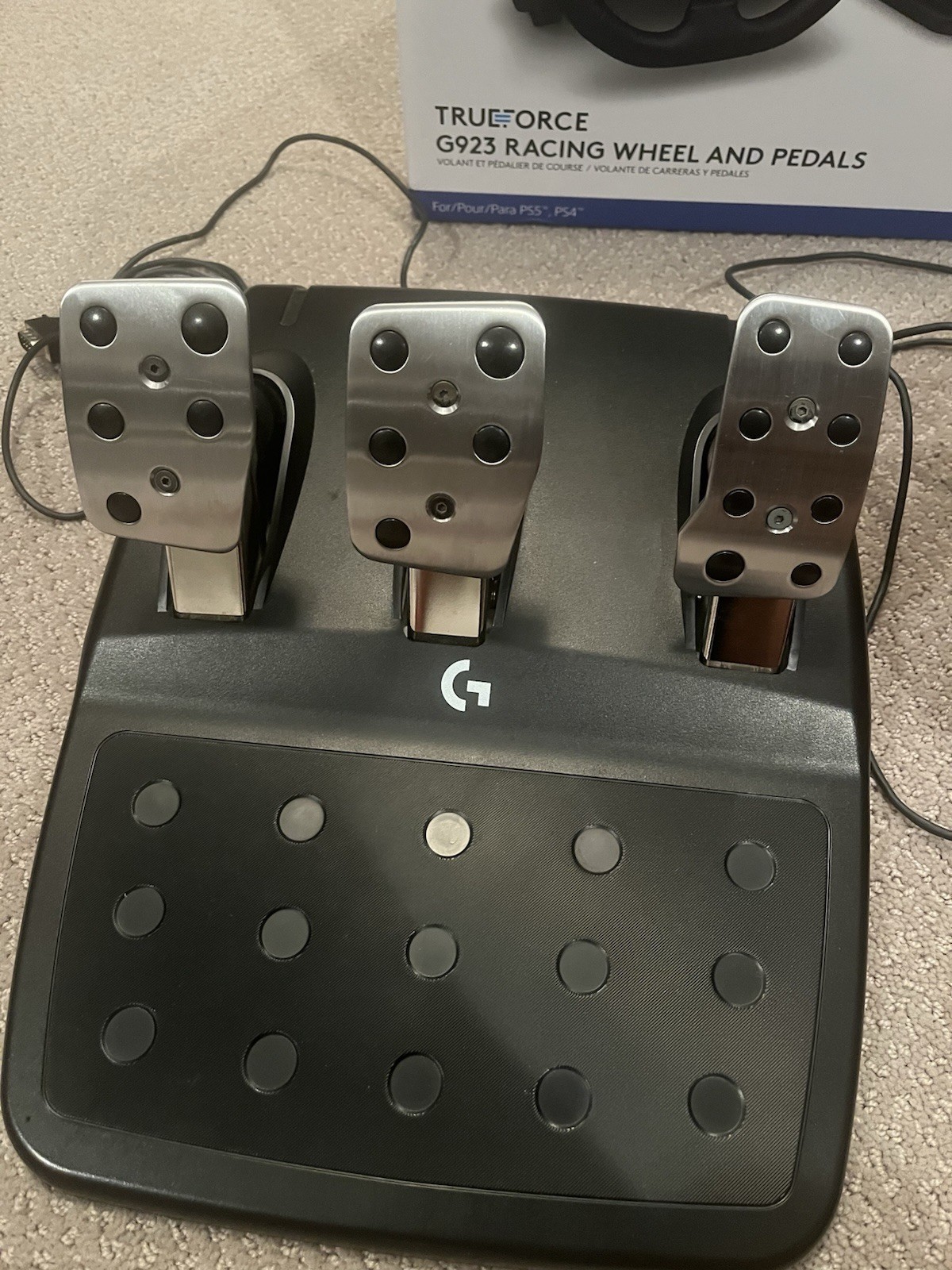 Logitech G923 Racing Wheel with Pedals, feels brand new.