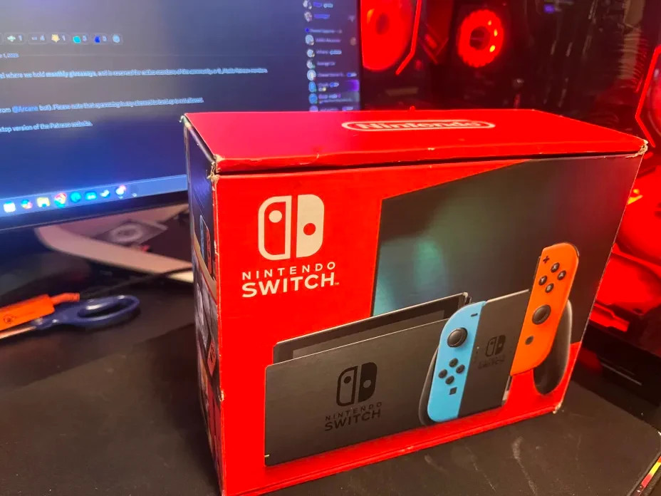 Nintendo Switch 32GB Handheld Console – Neon Red/Neon Blue
