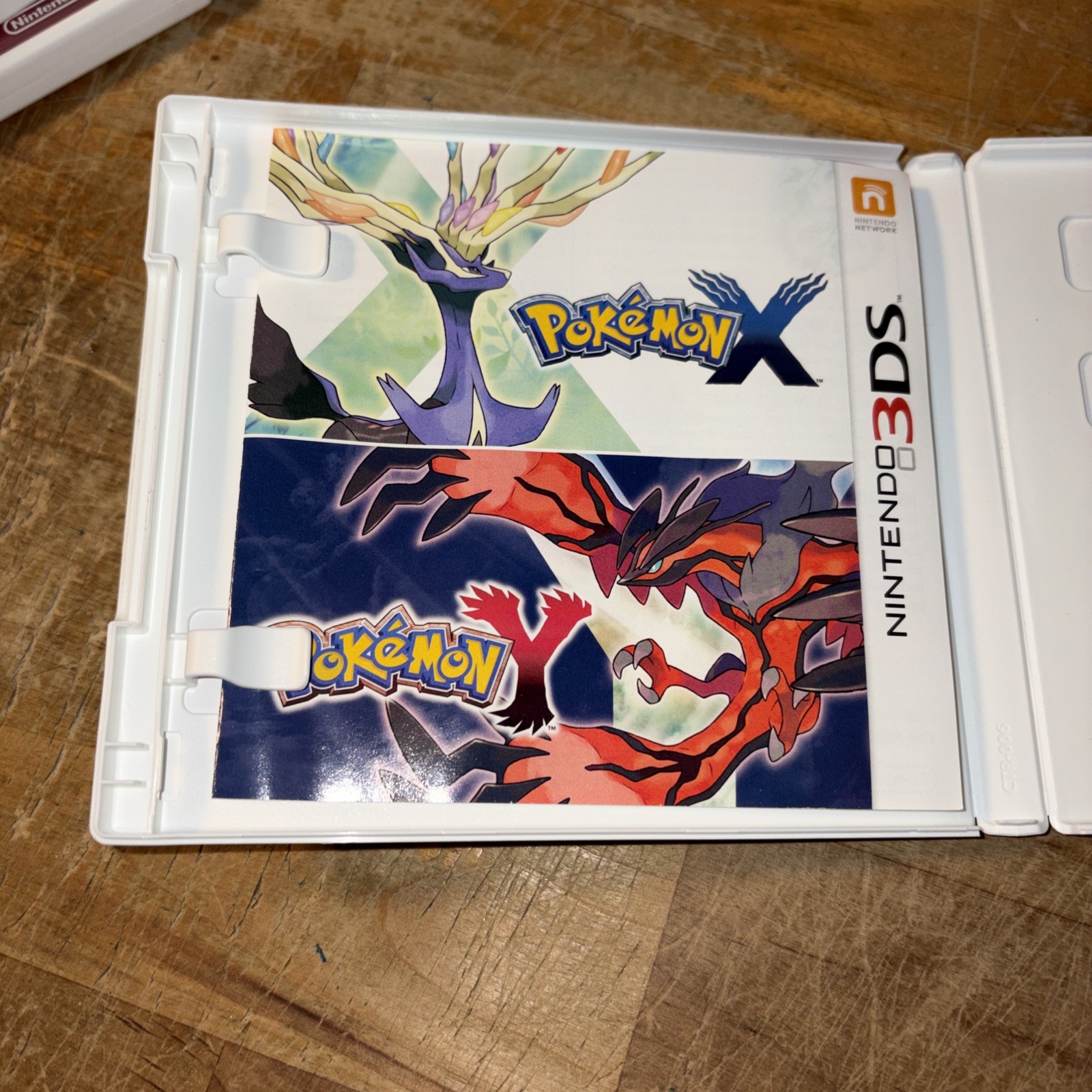 Pokemon X Nintendo 3DS used in case with inserts