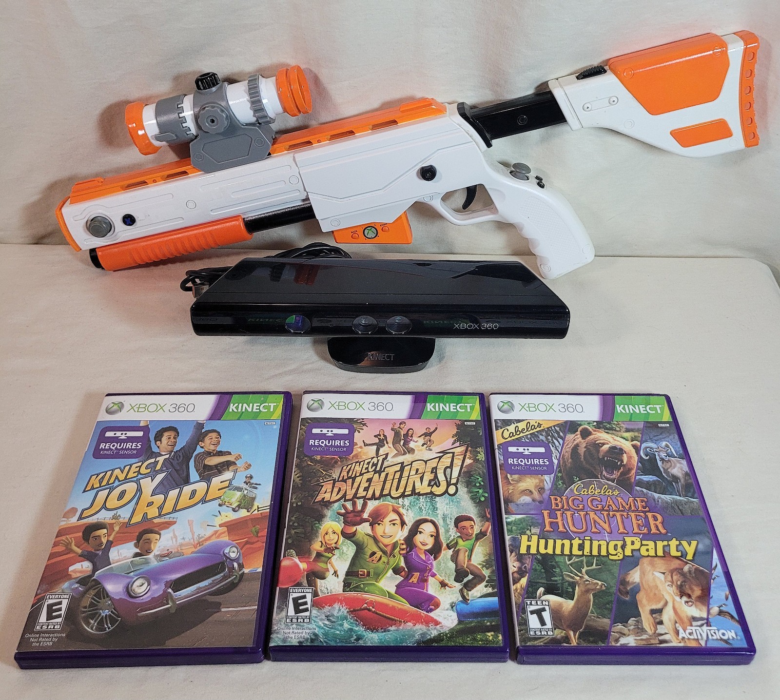 Xbox 360 Kinect Sensor Bundle + 3 Games + Top Shot Elite Wireless Gun Controller