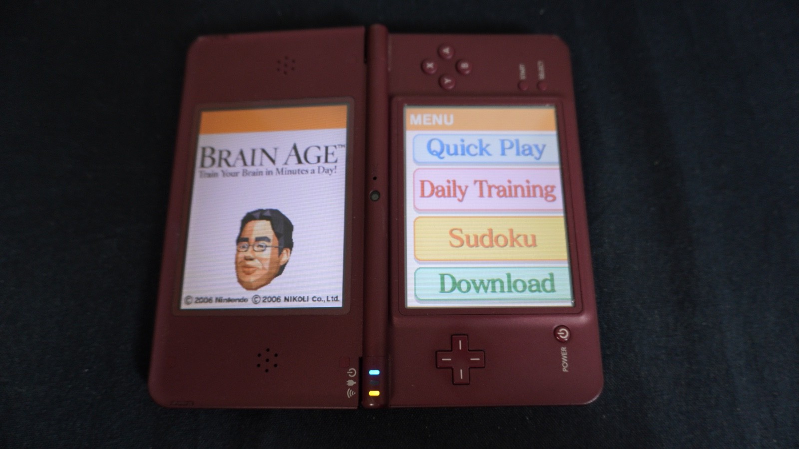 Nintendo DSi XL Launch Edition 256MB Handheld System – Burgundy