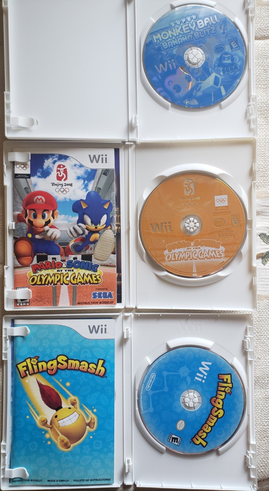 Wii Lot: Mario and Sonic at the Olympic Games, FlingSmash, and Super Monkeyball
