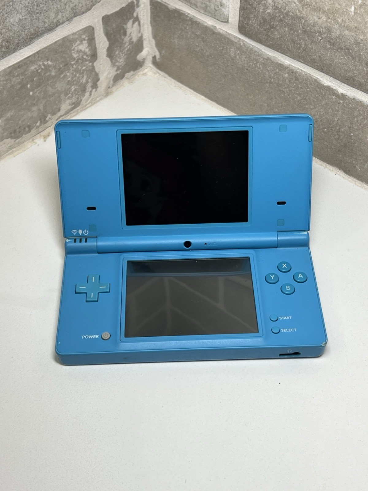 Nintendo DSi Light Blue Handheld Console Game System + Charger + Stylus Tested