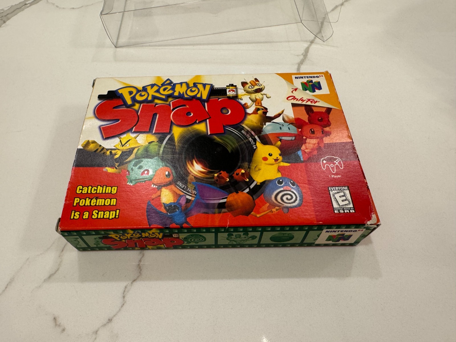 Pokemon Snap Complete in box – excellent condition with protective covers