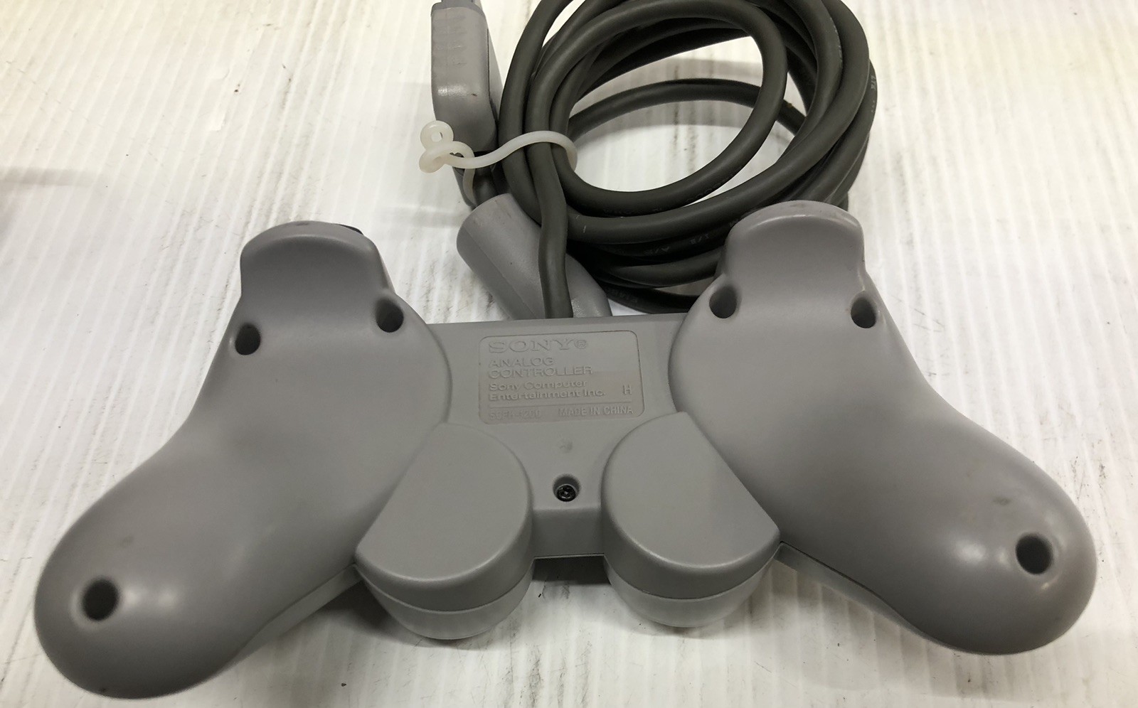 ORIGINAL PLAYSTATION 1 CONSOLE W/ CONTROLLERS TESTED WORKING GAME AND WHEEL LOT