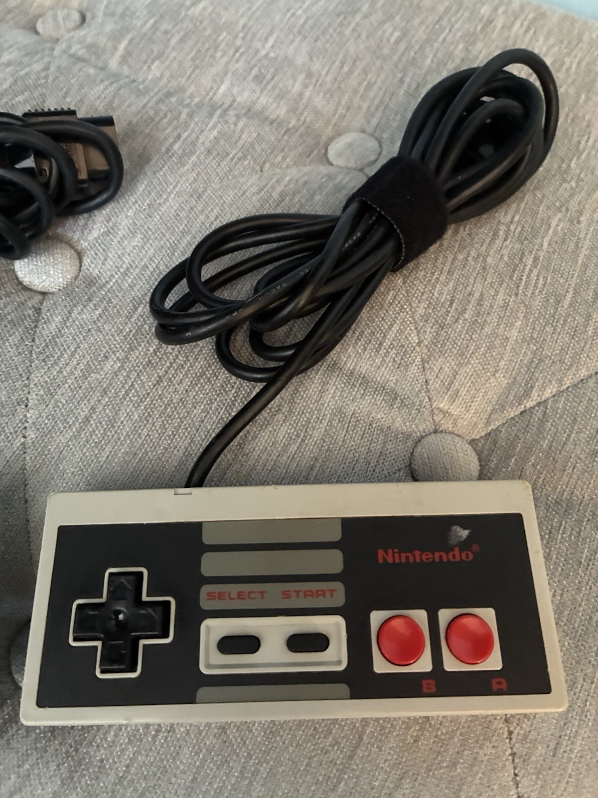 2 Vintage Nintendo NES OEM Controllers, RF Adapter, And Manual.
