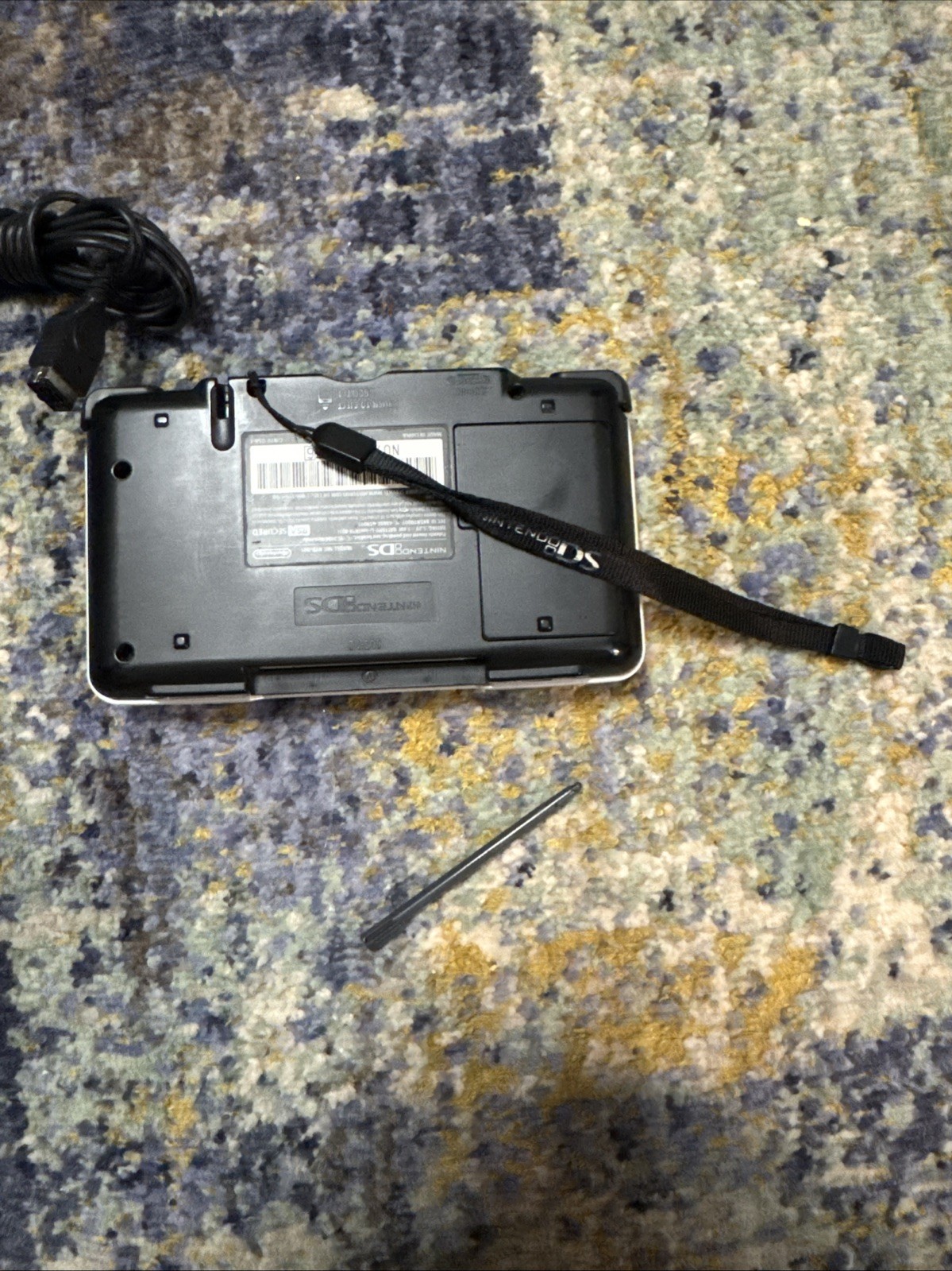 Nintendo DS Handheld System Silver with original wrist strap, stylus and charger