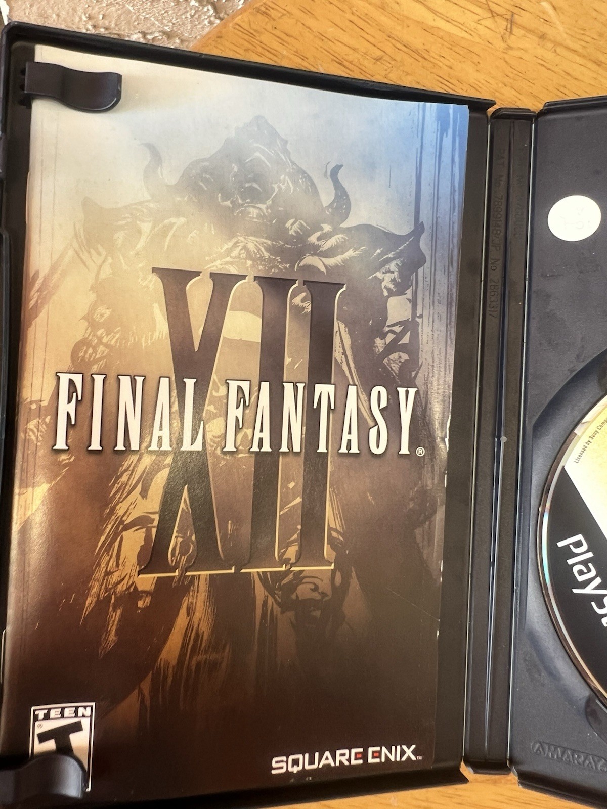 Square Enix Final Fantasy XII 2006 Teen Version Sony PlayStation W/ Book