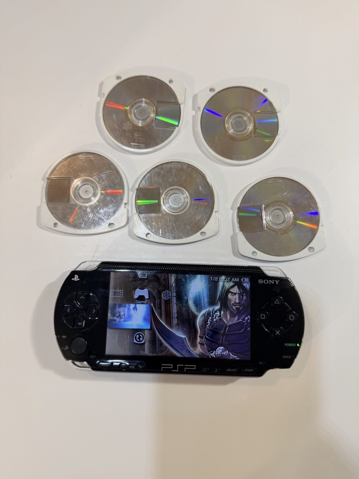 Sony PSP-1001 PlayStation Portable – Black W/6 Discs. Tested Working
