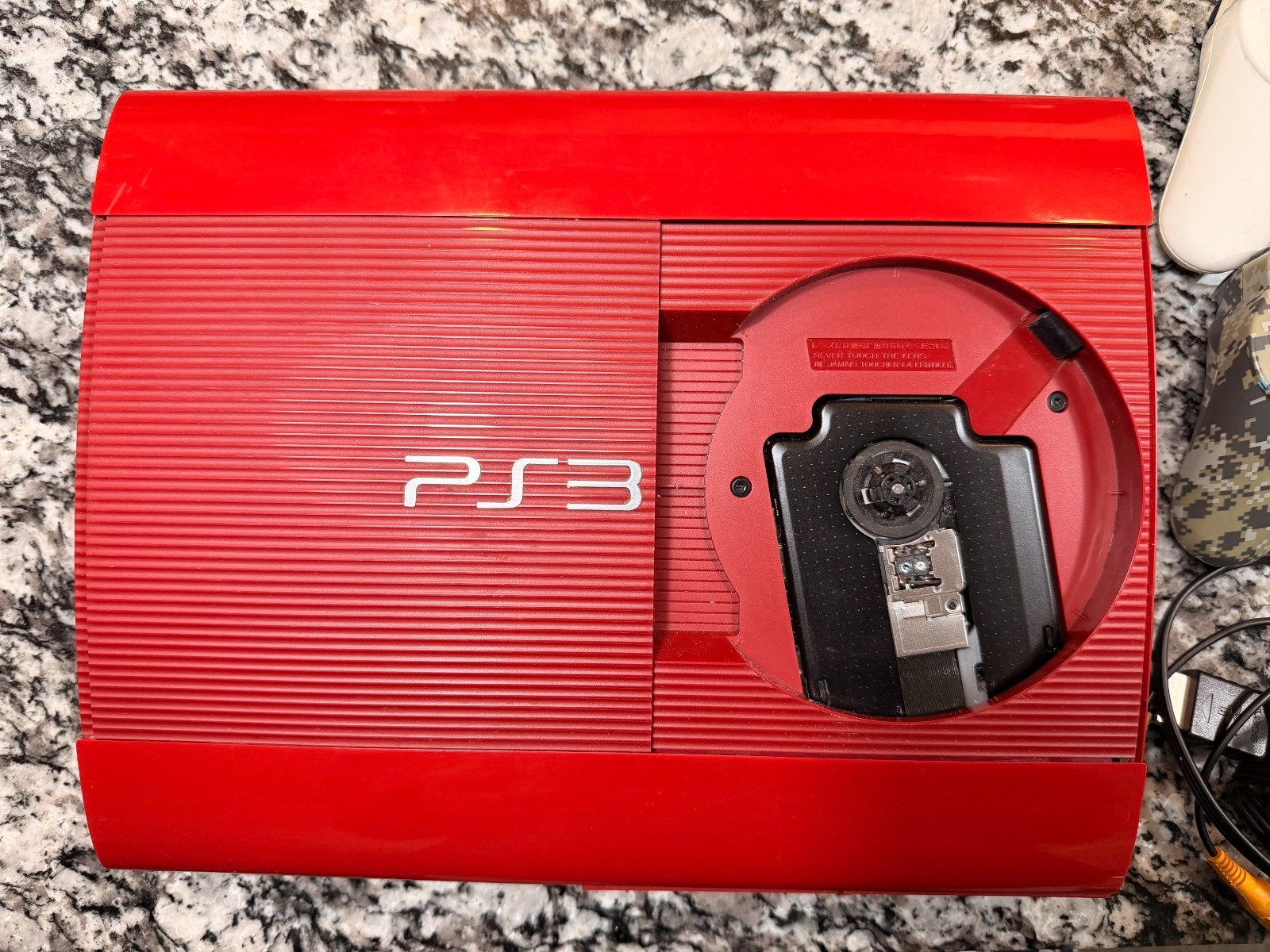 Sony PlayStation 3 Slim 500GB Garnet Red Edition Console with controllers