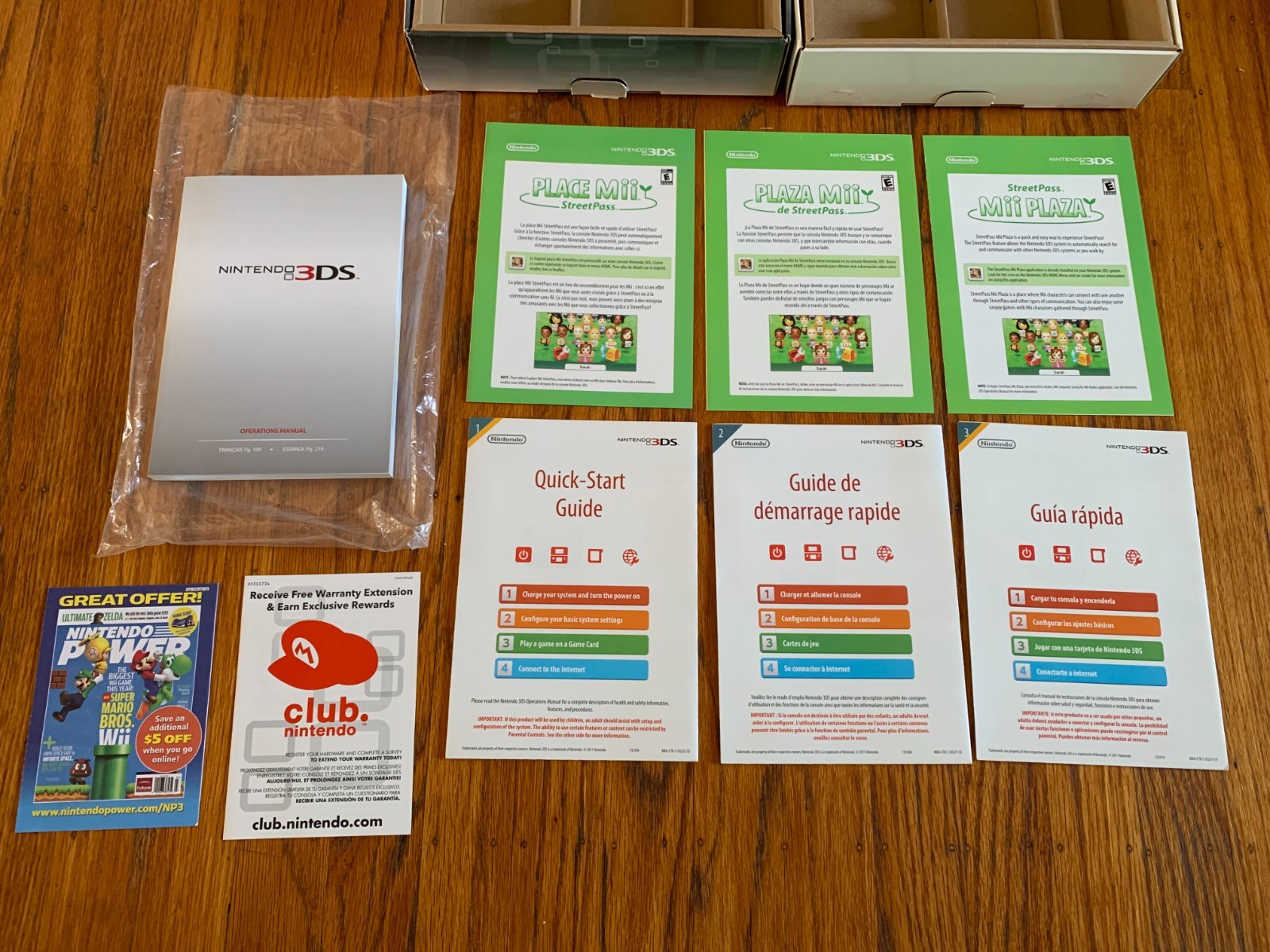 Lot of 2 Nintendo 3DS Cosmo Black and Flame Red console boxes and manuals only