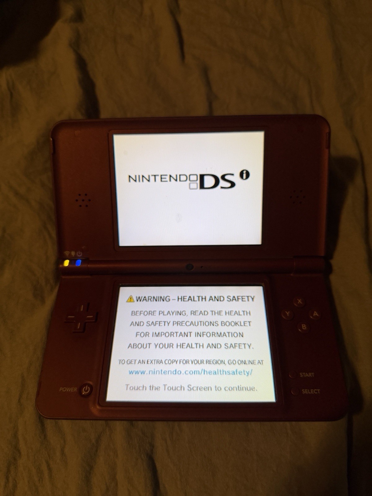 Nintendo DSi XL Handheld System – Burgundy Clean