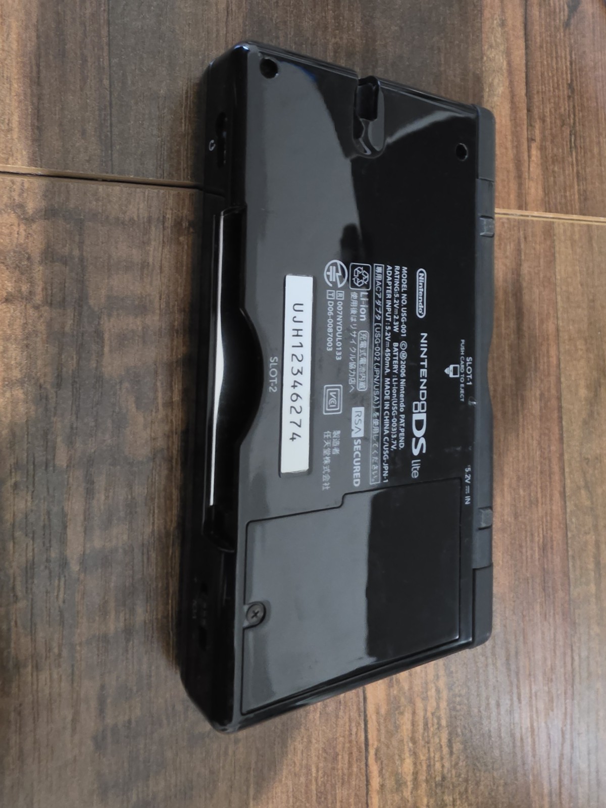 Nintendo DS Lite “AS IS” Handheld System – Onyx Black+charger(generic)+game