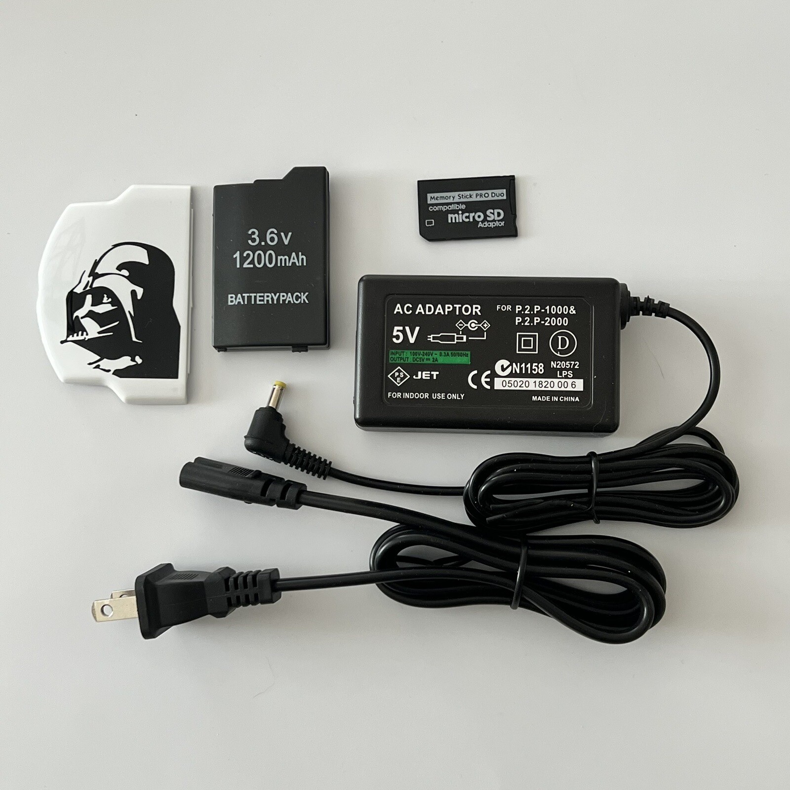 QUALITY PSP 2000 Kit – Battery, Charger, Star Wars Cover, 8gb Memory Card