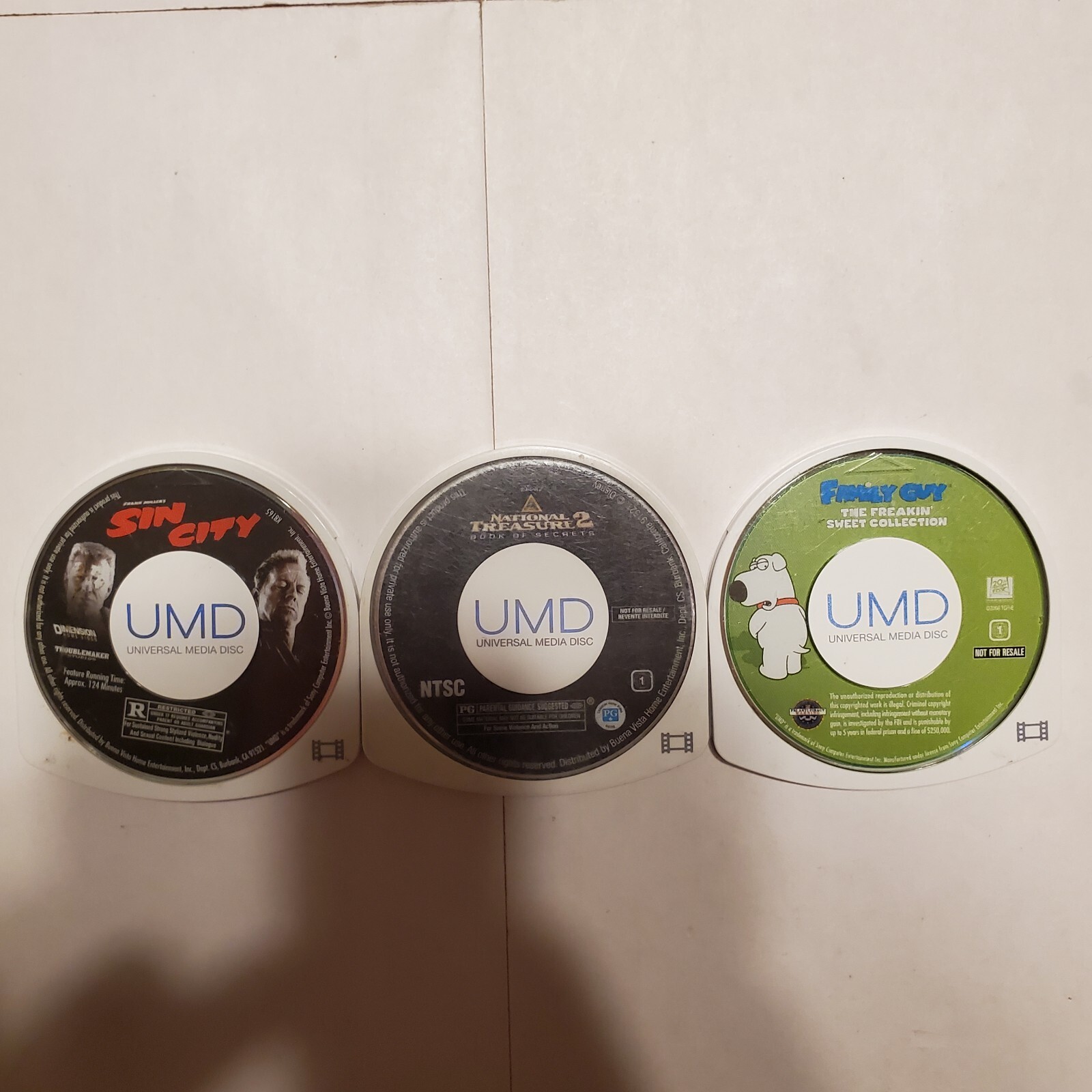 Family Guy: Freakin Sweet Collection, National Treasure 2, Sin City, UMD, TESTED