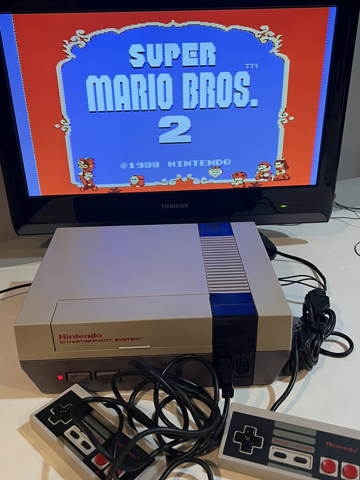 Nintendo NES Console Bundle – 7 Games – 2 Controllers – Tested And Working