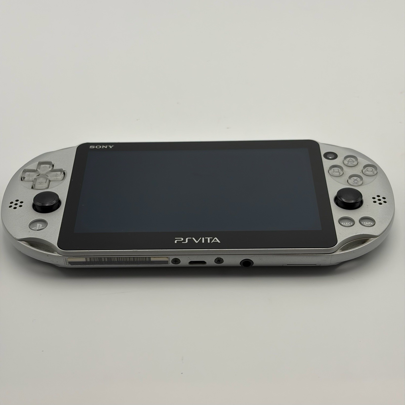 SONY PS Vita PCH-2000 Console Silver Very Good Fast Shipping No joystick drift.