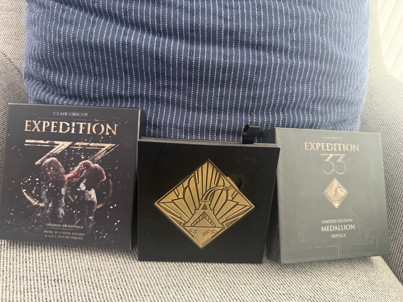 Clair Obscur Expedition 33 Limited Edition Medallion Replica And 8CD Soundtrack