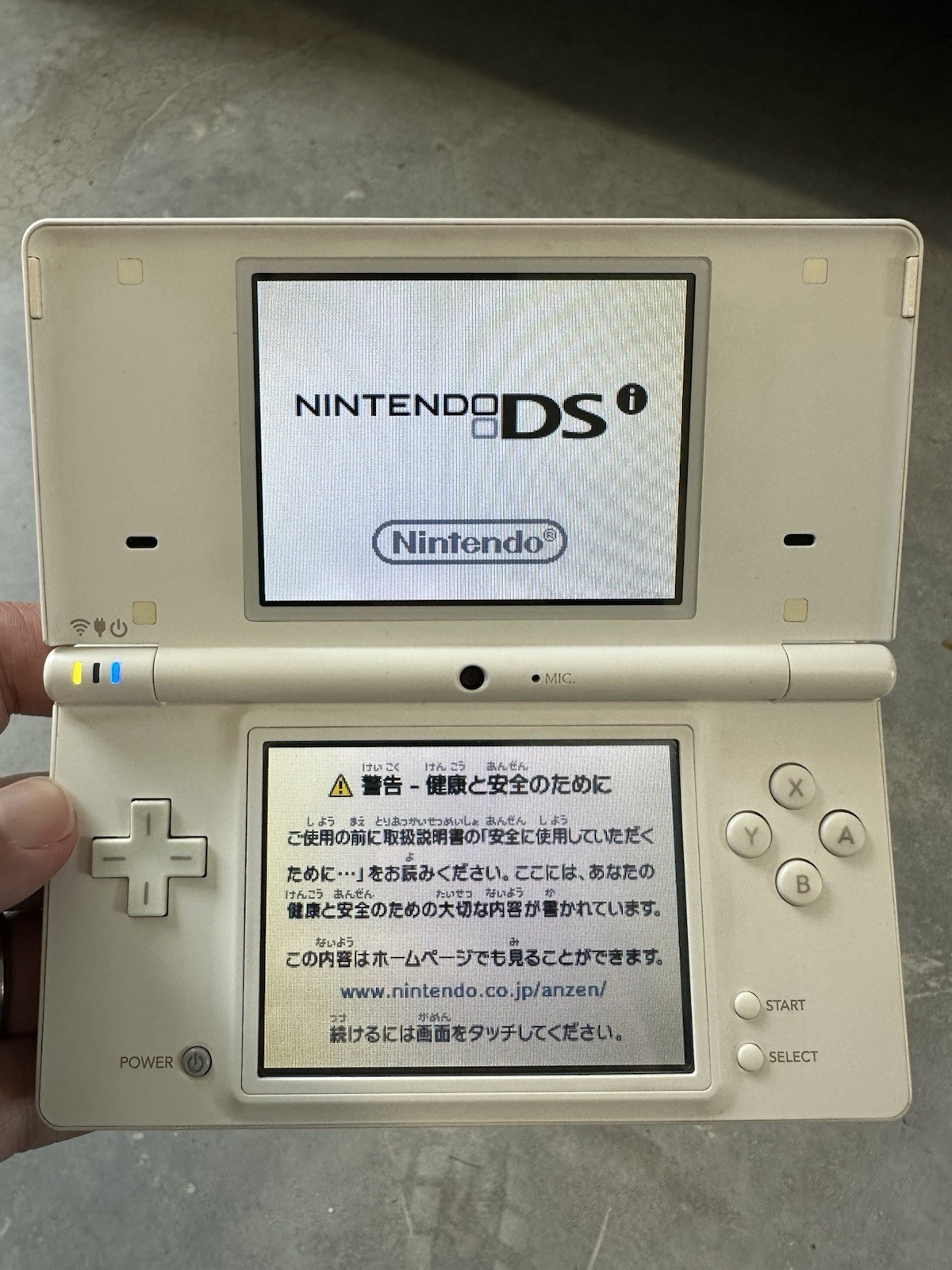 Nintendo DSi Arctic White (Japanese Import, region free) plus new charger