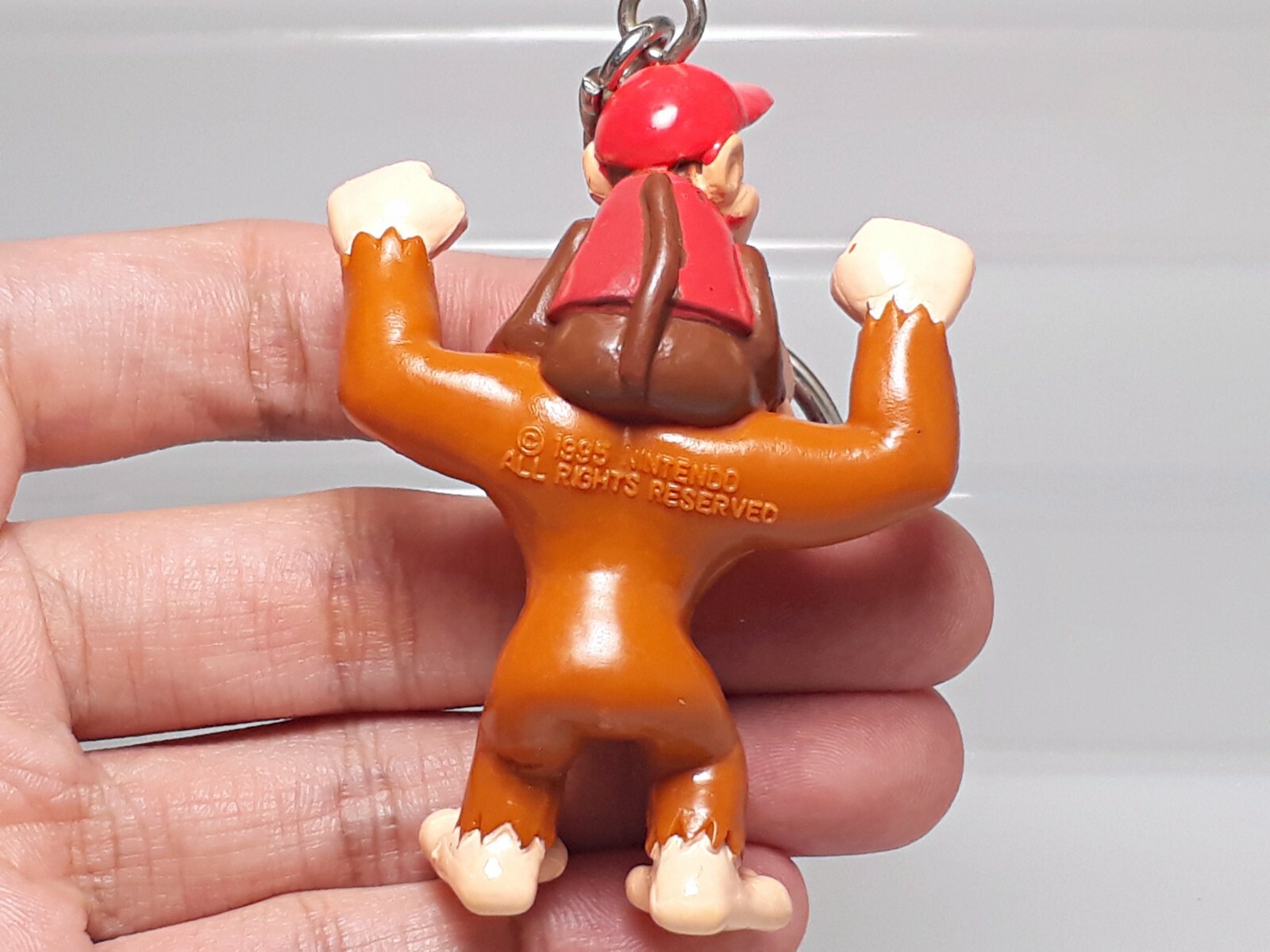 Diddy riding Donkey Kong Country Rumble in the Jungle Figure Keychain 1995 2.4in