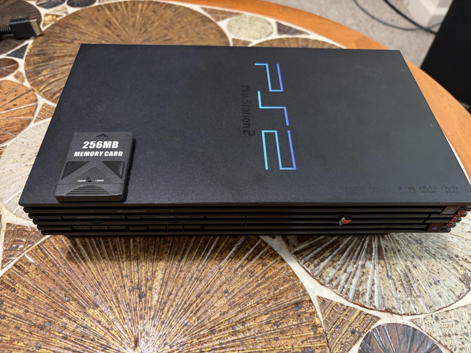 Sony PlayStation 2 (SCPH-30001) With 2 Controllers, 3 Games, And 256 MB Card