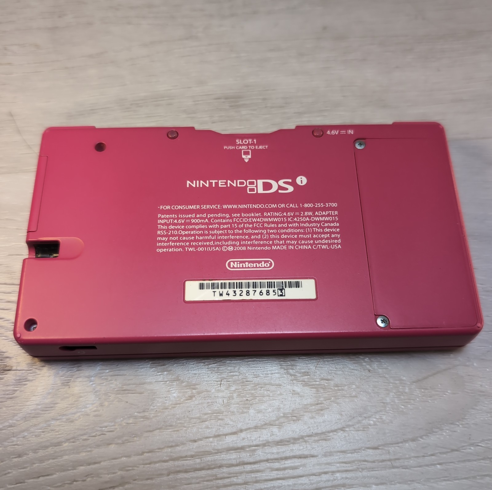 Nintendo DSi Pink Handheld Console Wi-Fi Nintendo DS TWL-001 & (4) Games Sims