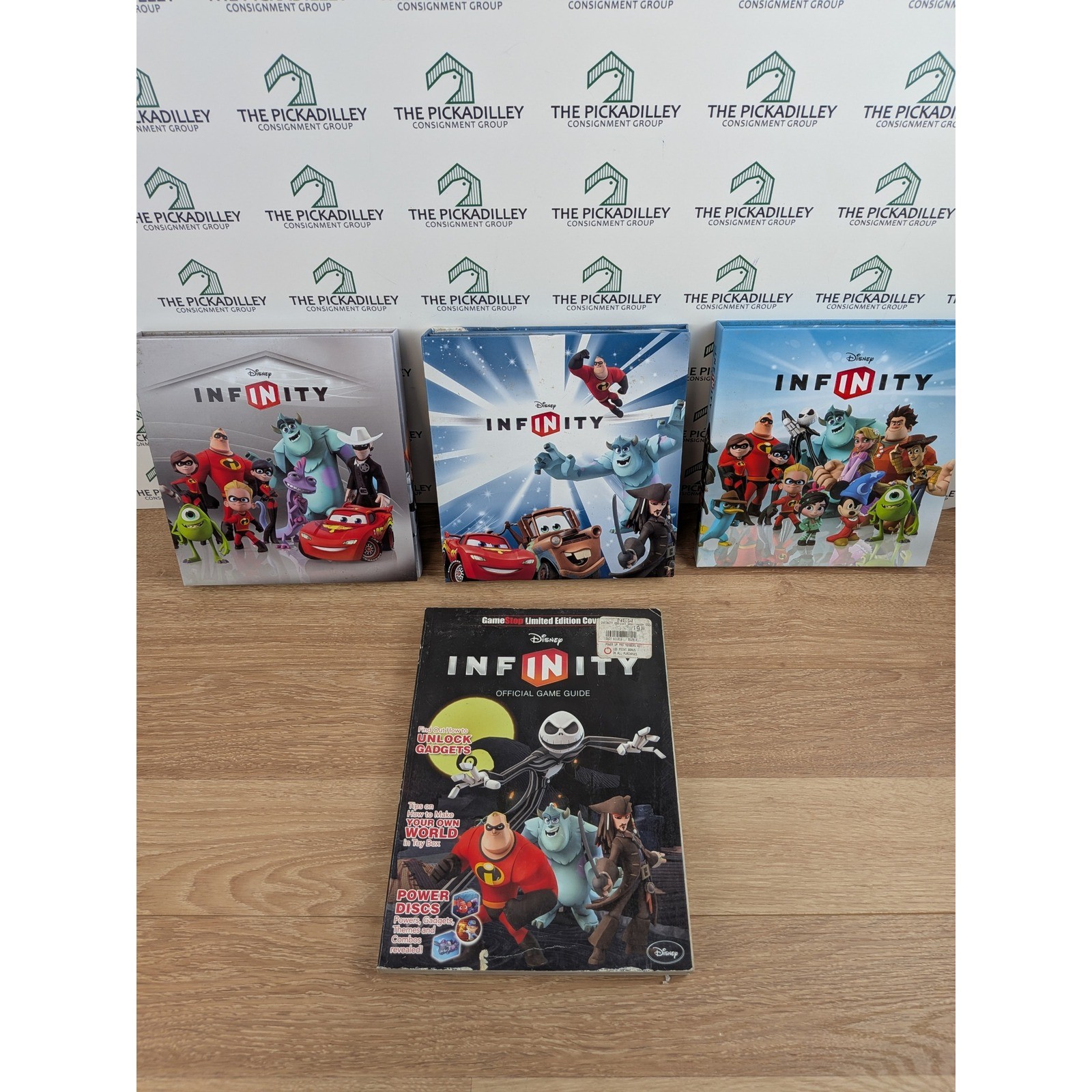 Disney Infinity Power Disc Albums Incomplete & GameStop Game Guide Bundle
