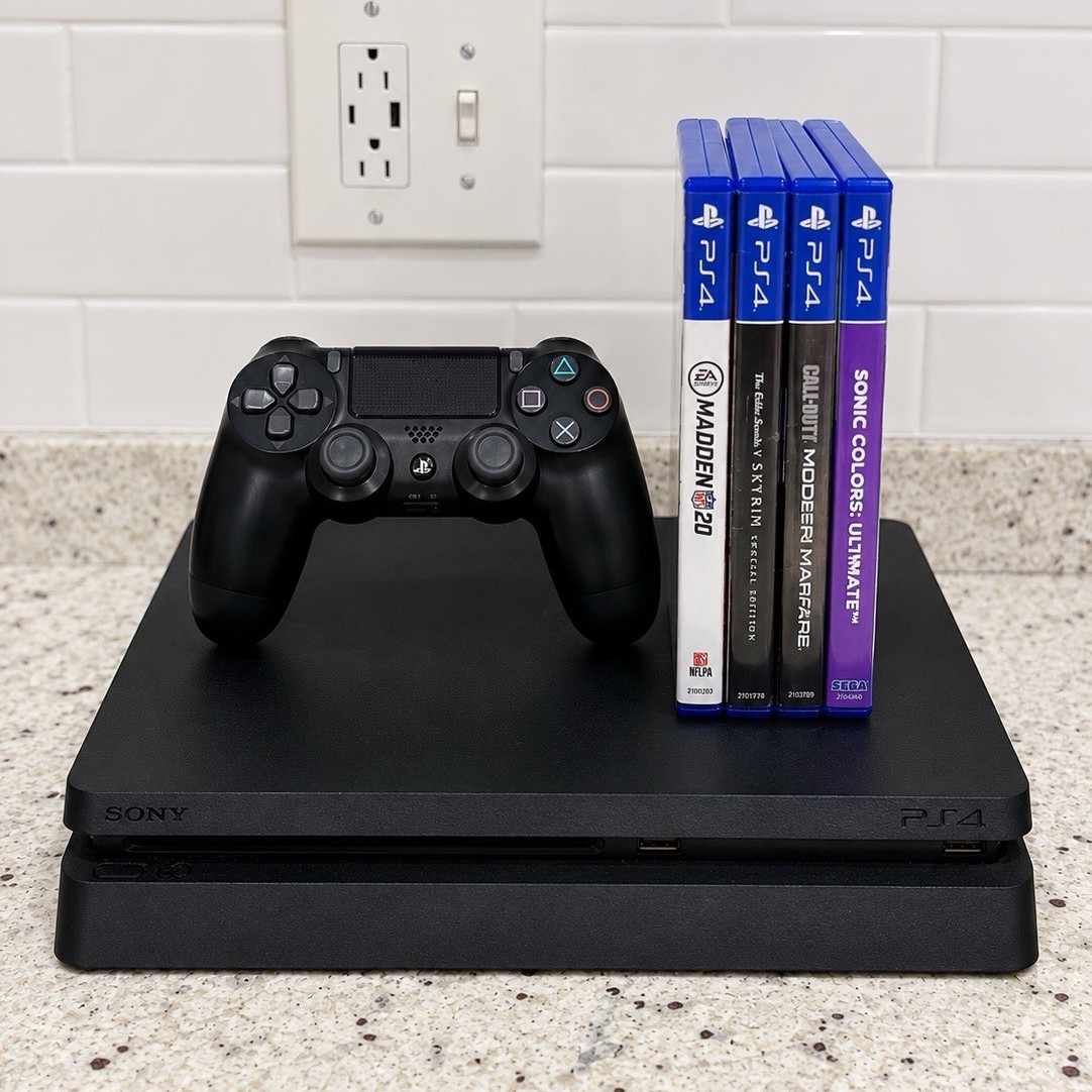 Sony PS4 Slim 4K Black Console w/ DualShock 4 + 4 Games Bundle