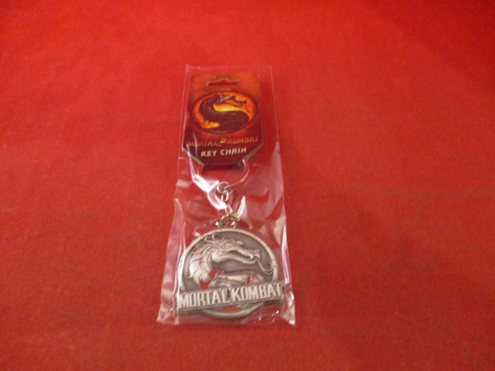 Mortal Kombat Logo Keychain Silver Color Warner Bros. BRAND NEW