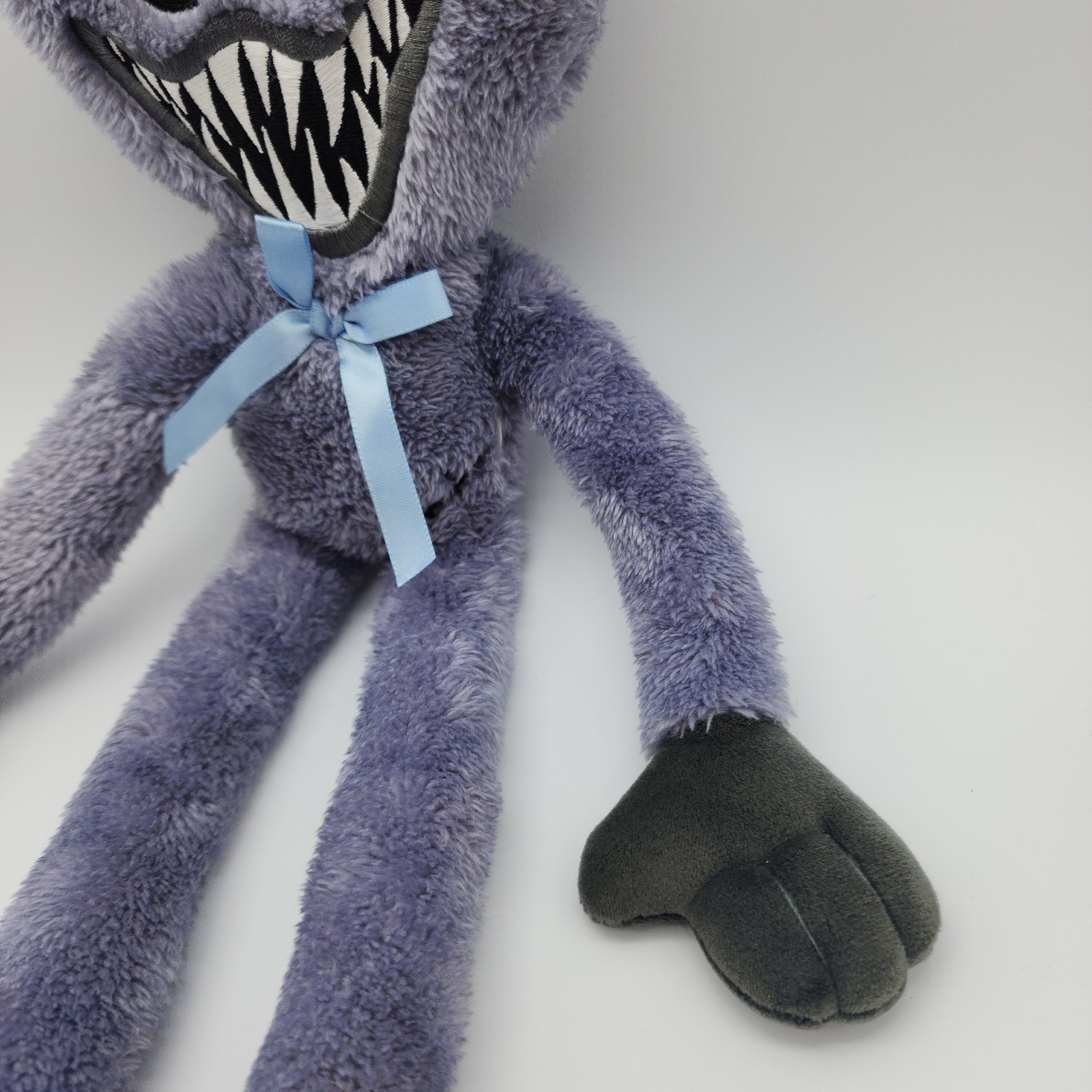 Official Poppy’s Playtime Grey Stitched Huggy Wuggy Plush Toy with Blue Bow