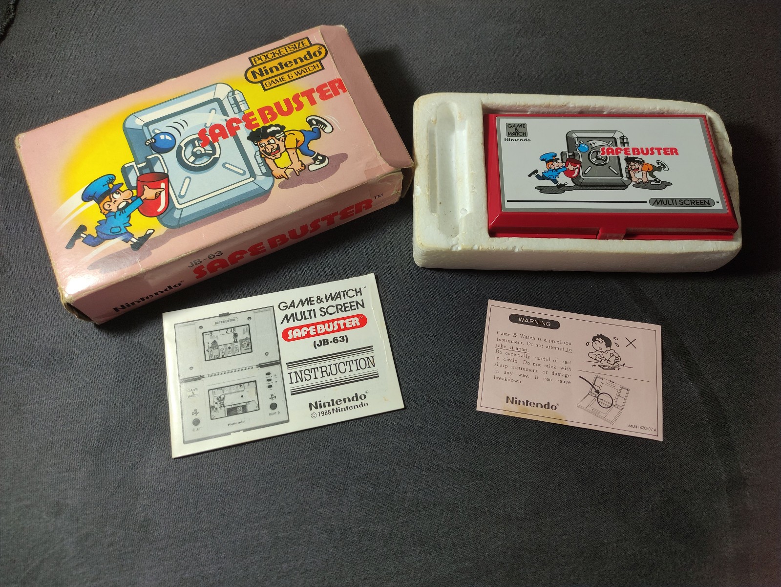 Vintage Nintendo Safe buster Multi Scren Game and watch cib complete pocket size