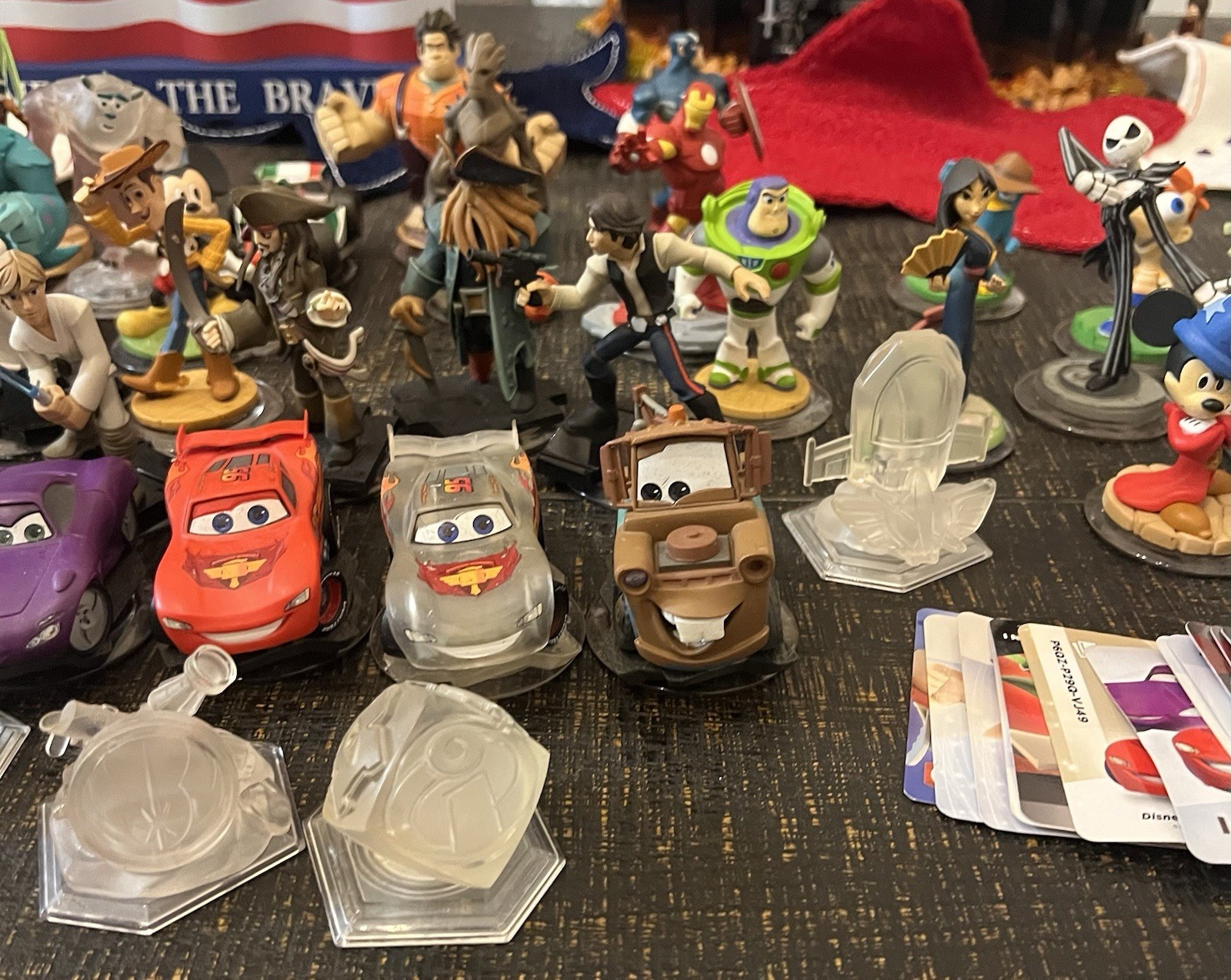 Assortment of Disney Infinity Figures With Power Disks And Play Cards (Not All)