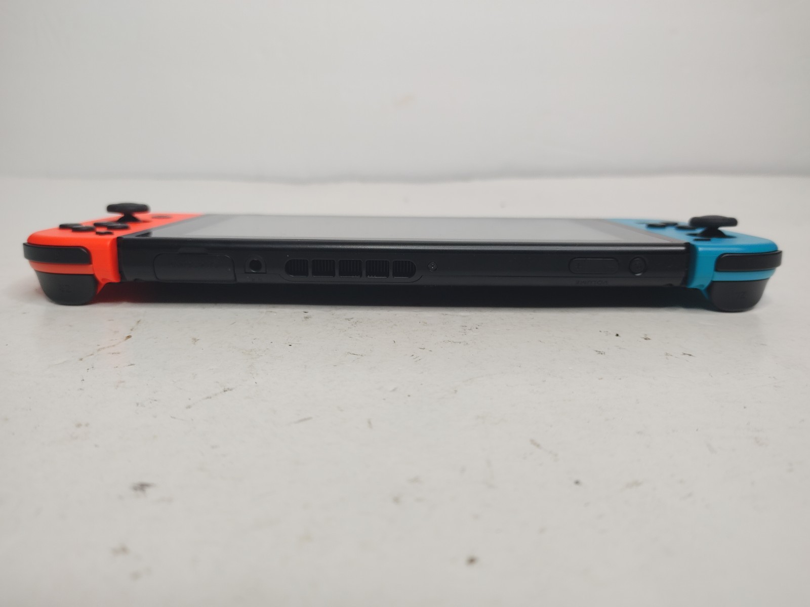 Nintendo Switch HAC-001 Console w/ Dock, Red/Blue Joy-Con