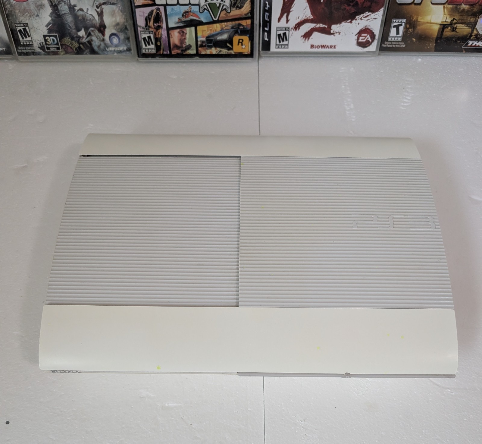 Sony PS3 Super Slim 500GB White Console Bundle 2 OEM Sony Controllers 8 Games…