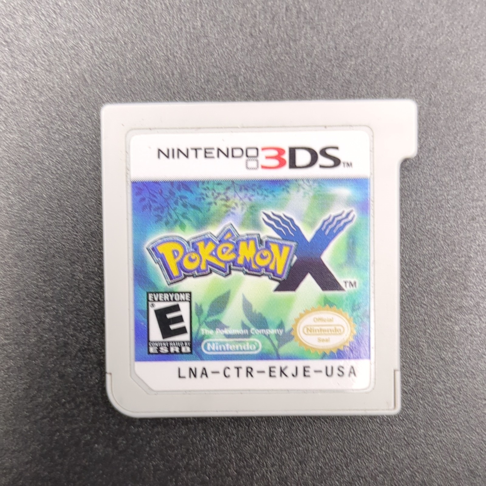 Nintendo New 3DS XL Red Console Bundle w/ Pokemon Platinum, Sun, X, Omega Ruby