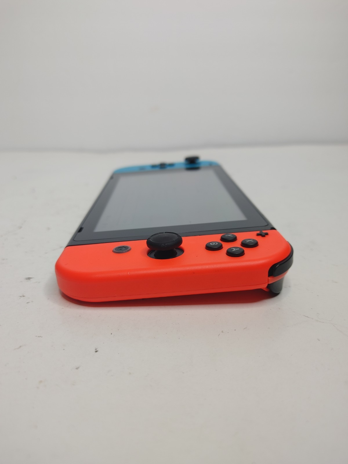Nintendo Switch HAC-001 Console w/ Dock, Red/Blue Joy-Con