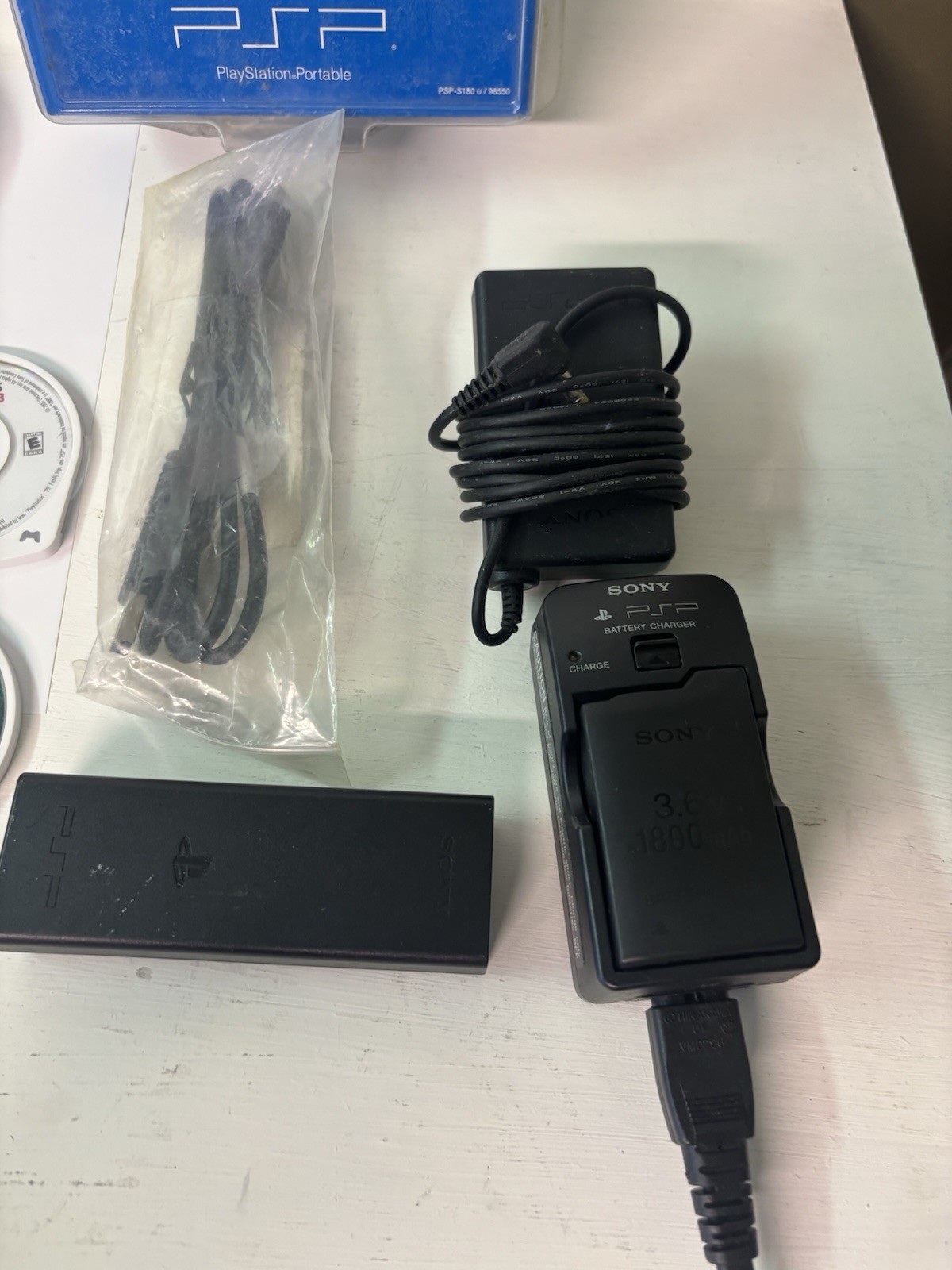 Sony PSP 1001 Bundle – 24 Games/UMDs, Charger, Case, AV Cord + More (read)